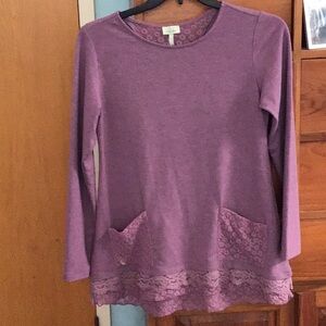 This is a beautiful light purple tunic byLOGO LONGE.